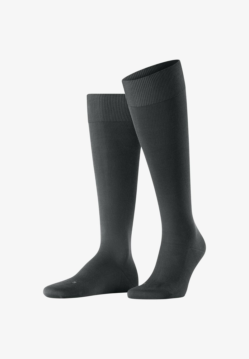 Knielange, dunkelgraue Socken aus einem gerippten Stoff. Verfügen über einen dehnbaren Bund und eine glatte Textur mit verstärkter Zehen- und Fersenpartie.