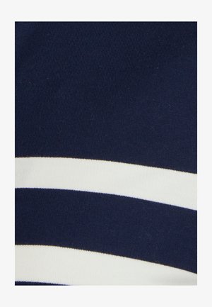 Tejido azul marino con rayas blancas horizontales. Textura suave, diseño ajustado y distribución de color uniforme en toda la superficie.