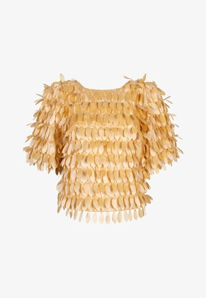 Blouse jaune en satin à manches courtes avec des rangées d'appliqués ovales superposés couvrant entièrement le vêtement.