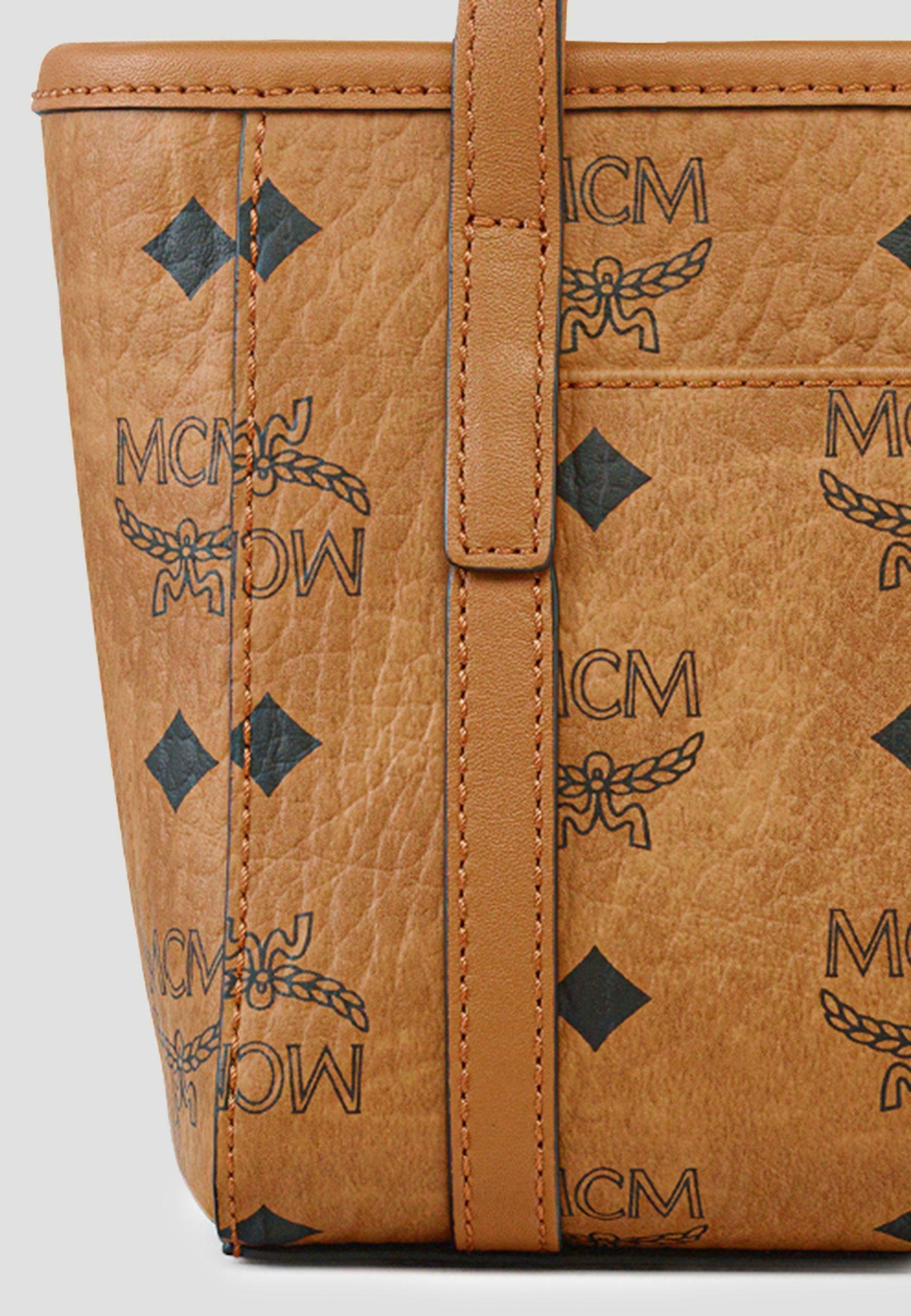 mcm ロゴプリント ボディバッグ ブラウン MCM（エムシーエム）の「〈クラシック〉N/S クロスボディバッグ