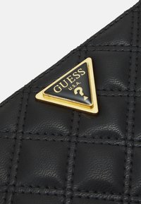 Guess GIULLY CHEQUE ORGANIZER - Lompakko - black
