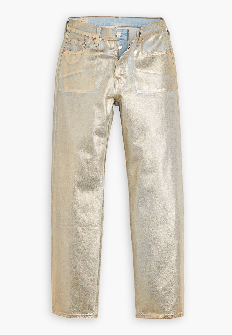 Jeans métalliques dorés au design droit, cinq poches, quincaillerie en cuivre et finition texturée. Présente une taille en denim bleu.