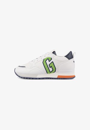 White sneaker with perforated leather, blue accents, and a large green "G" logo. Features a textured sole and an orange stripe at the heel.
