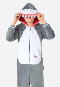 Grijs en witte haai-thema rompertje, met een ritsluiting aan de voorkant, een capuchon met tanddetails en een voorzak met een klein roze eendlogo.