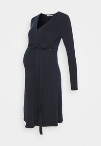 Vestido de maternidade de manga longa em azul marinho escuro, feito de tecido macio, com decote em V e um cinto atado na cintura para um ajuste ajustável.
