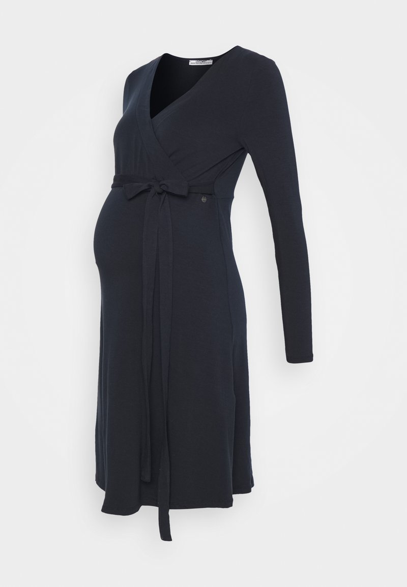 Vestido de maternidade de manga longa em azul marinho escuro, feito de tecido macio, com decote em V e um cinto atado na cintura para um ajuste ajustável.