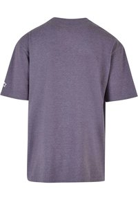 Purple cotton t-shirt with short sleeves, crew neck, and a smooth texture. Features a small star embroidery on the left sleeve.