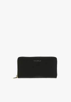 Coccinelle, Monedero - fango