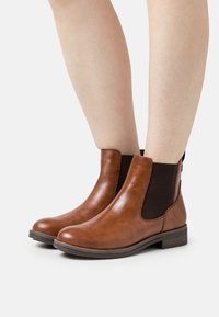Tamaris Boots à talons - cognac