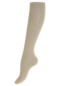 Chaussette jusqu'aux genoux en beige clair, fabriquée en matériau doux, avec une texture lisse et un bout renforcé, offrant un ajustement serré en haut.