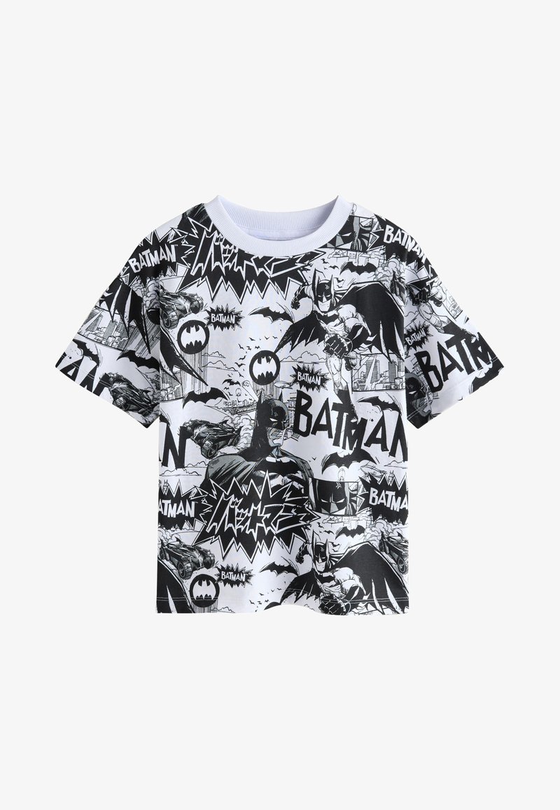 T-shirt noir et blanc présentant diverses images et logos de comics Batman. Manches courtes, col rond, en tissu coton.