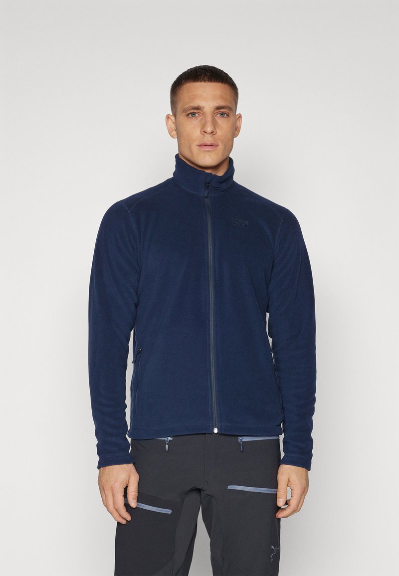 Navy blue fleece jacket with a high collar, full front zipper, and two side zip pockets; soft texture with a close-fitting design.