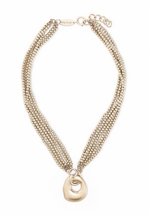Naszyjnik z wieloma rzędami złocistych koralików z ozdobą w postaci nierównych, przeplatających się kół oraz regulowanym zapięciem na łańcuszku.