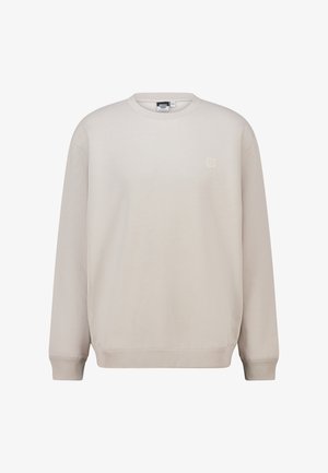 Sweatshirt beige à manches longues, col et poignets côtelés, avec un petit logo embossé sur la poitrine. Fabriqué en tissu doux et extensible.