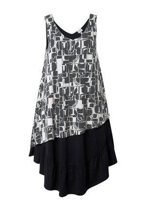 Abito senza maniche con un motivo geometrico bianco e nero nella parte superiore e un'ampia sezione inferiore nera a balze, realizzato in tessuto leggero.