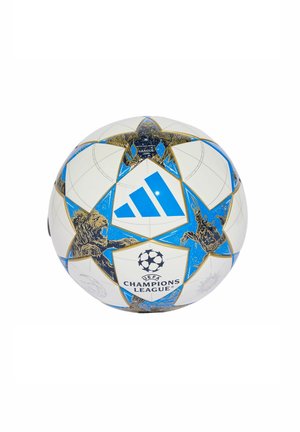 Ballon de soccer blanc de la Ligue des champions de l'UEFA avec des étoiles bleues, logo Adidas, et illustrations de lion et de dragon dorés.