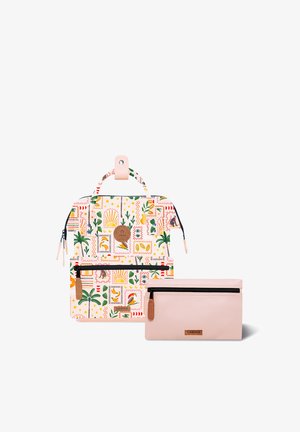 Small backpack with colorful tropical prints and beige zippered pouch with leather zipper pulls, both branded "Cabaia," on white background.