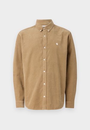 Brown corduroy shirt with a button-down collar, white buttons, and a small logo on the chest. Long sleeves and a tailored cut.