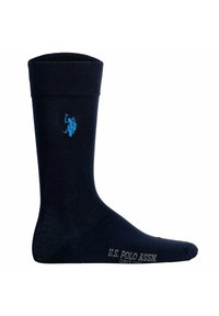 Knähög, mörkblå socka med ribbad mudd, med en ljusblå broderad logotyp och grå text på sulan. Mjuk, elastisk material.