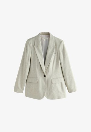 Šviesiai smėlio spalvos lino švarkas su vienu mygtuku, su įpjautomis atlapomis ir kišenėmis su atvartais, pateiktas ant baltos fono.