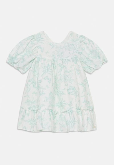 Hvid kjole med lys grøn blomsterprint, korte pufærmer og en flæset kant. Blødt stof, rund halsudskæring og løst fit.