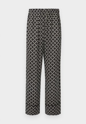 Schwarze Hose mit einem weißen Diamantmuster, mit einem elastischen Bund, Kordelzug und weitem Beinschnitt. Leichter Stoff.