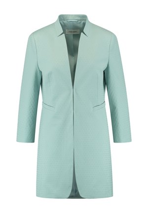Blazer long vert d'eau clair avec motif texturé subtil, col à revers, manches trois-quarts, deux poches fendues à l'avant, modèle ouvert.