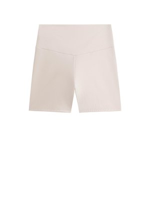 Bež športne kratke hlače so narejene iz mehke, raztegljive tkanine. Imajo visok pas in preprost, čist dizajn brez vidnih vzorcev.
