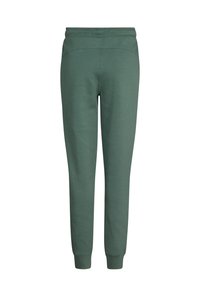 Zelené tepláky vyrobené z měkkého materiálu, s elastickým pasem, zúženými nohavicemi a žebrovanými manžetami. Minimalistický design bez viditelných vzorů.