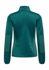 Petrolblå langærmet sportjakke med ribbet albuepaneler, høj krave og figursyede sømme, vist bagfra.