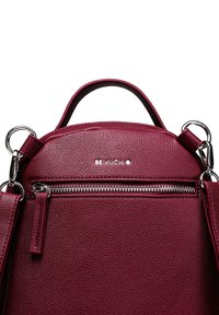 Burgundy leather handbag with pebbled texture, silver hardware, top handle, and front zipper pocket. Brand name "BE VUCH" displayed.