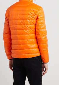 Blauer Dunjakker - orange