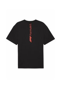 Sort T-shirt med et lodret rødt "Formula 1" logo på ryggen. Enkel og stilfuld design, der er optimeret til racingsfans.