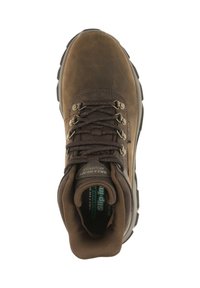 Brown leather hiking shoe with metal eyelets, rounded toe, padded collar, and textured rubber sole; designed for durability and comfort.