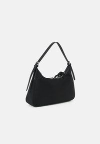 Black leather handbag with a curved shape, detachable shoulder strap, zip closure, and smooth texture. Features silver-tone hardware.
