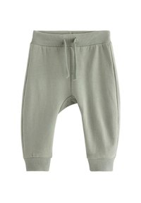 Jasnozielone, miękkie dresy z bawełny z żebrowanym pasem i mankietami, z detalami w postaci sznurka i regulowanym krojem.