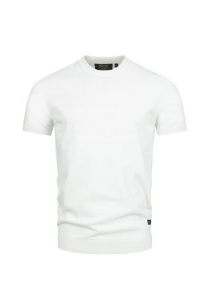Jersey blanco de manga corta con cuello redondo de punto, con cuello, puños y bajo acanalados, con una pequeña etiqueta negra de la marca en el bajo.
