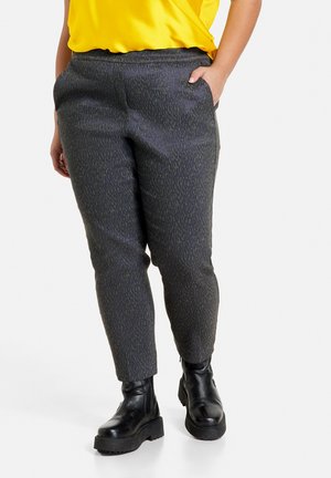 GRETA - Trousers - pine green gemustert