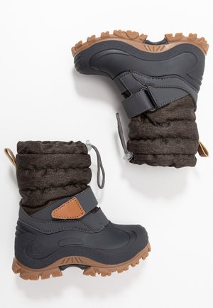 Insulated dark gray winter boots with a brown textile upper, rubber sole, adjustable strap, and textured tread for traction.