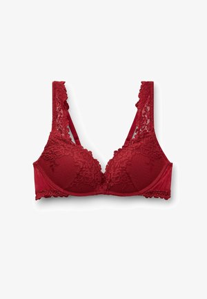 Červená krajková podprsenka s květinovým vzorem, vycpanými košíčky, vlnitými okraji a nastavitelnými ramínky. Vyrobeno z měkké, strukturované tkaniny.