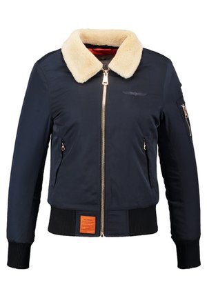 Chaqueta bomber de la marina con cuello de piel sintética crema, cierre con cremallera en la parte delantera, bolsillos laterales, puños acanalados y una etiqueta texturizada naranja en el dobladillo.