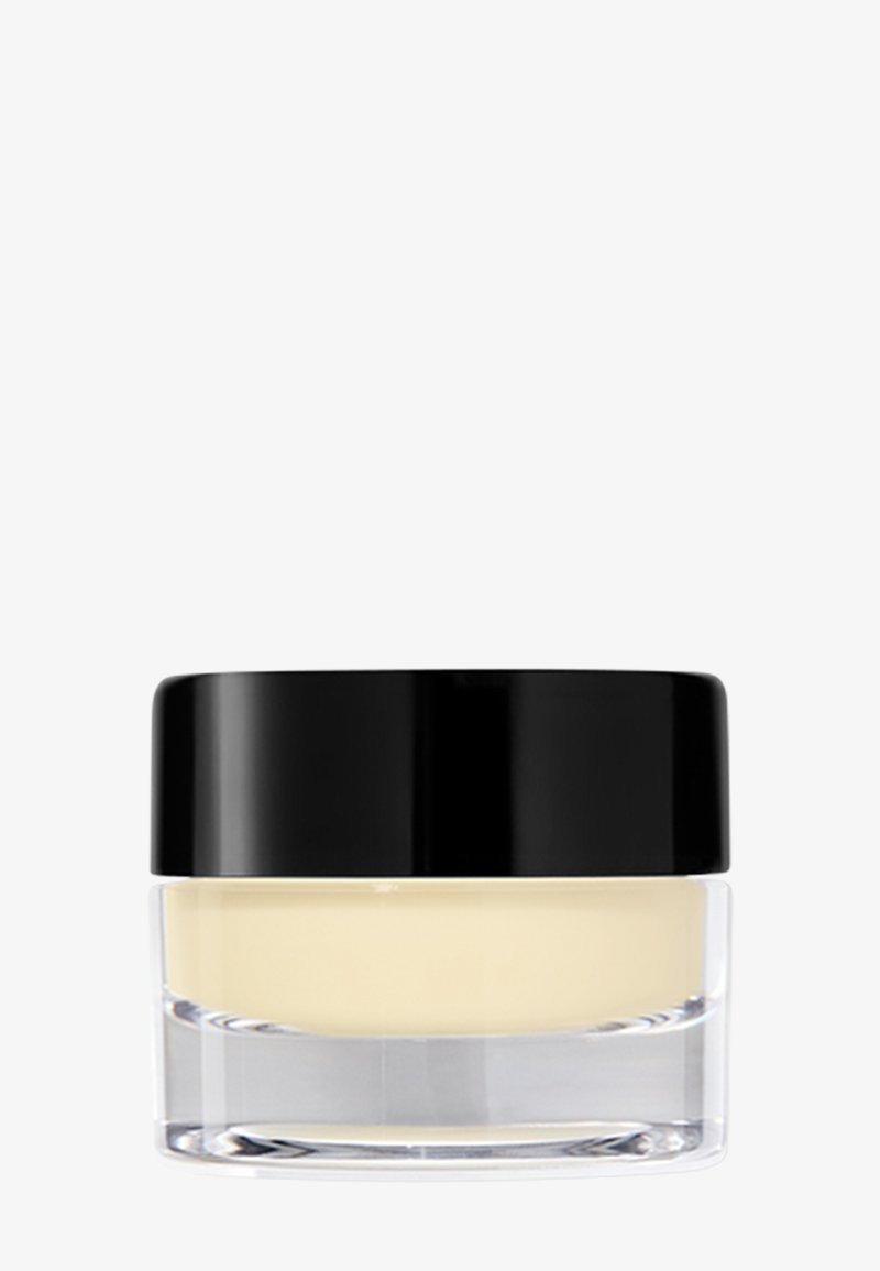 Bocal en verre transparent avec un couvercle noir. Contient un produit crémeux de couleur jaune pâle. Texture lisse, forme ronde et design minimaliste.