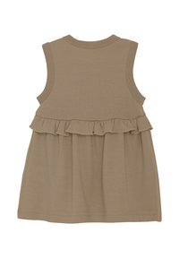Ljusbrun ärmlös klänning med volangnedre. Tillverkad av mjukt, lätt tyg med en slät textur, justerbar halsringning.