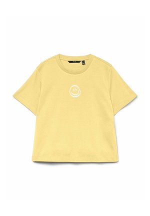 T-shirt jaune à manches courtes avec un petit motif de visage souriant blanc centré sous l'encolure, col rond et coupe décontractée.