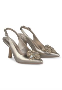 Talons slingbacks métalliques dorés avec un bout pointu, ornés d'embellissements floraux avec des pierres précieuses et un talon bloc modéré.