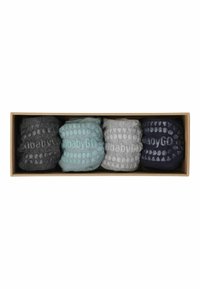 Quatre paires de chaussettes roulées antidérapantes en gris foncé, bleu sarcelle clair, gris clair et bleu marine, disposées côte à côte dans une boîte rectangulaire en carton.