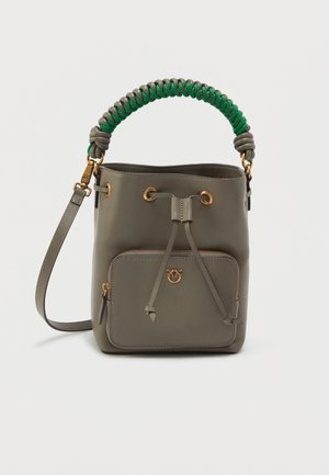 Gray leather bucket bag with green woven handle, gold hardware, drawstring closure, and a front zip pocket. Smooth texture with subtle sheen.