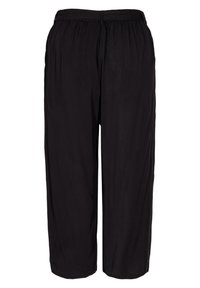 Pantalones negros de pierna amplia, confeccionados en una tela ligera con cintura elástica y una textura suave, presentando un diseño ajustado sin bolsillos.