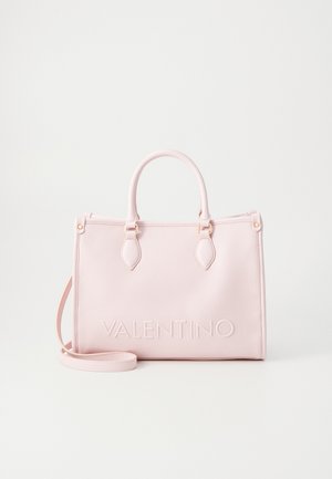 RISED  - Handbag - cipria