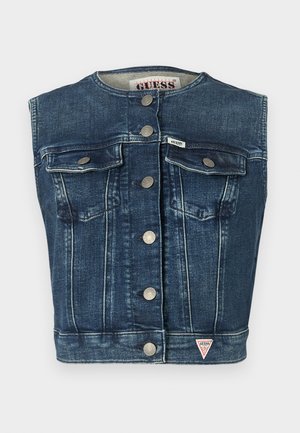 Veste en denim bleu foncé avec un col rond, deux poches poitrine, des boutons métalliques et un petit logo en patch au bas.